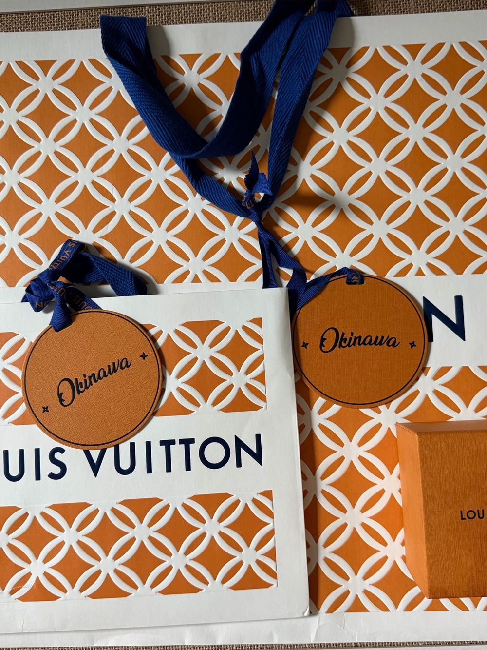 Rare Louis Vuitton Orange Okinawa bag and Round Tag Accents. Two bags